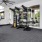 apartment fitness center with weight lifting equipment at 1333 South Ocean apartments in Pompano Beach