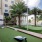 apartment greenspace with putting green and bean bag toss at 1333 South Ocean apartments in Pompano Beach