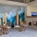 outdoor lounge with fireplace and TV at 1333 South Ocean apartments in Pompano Beach