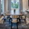 Large conference room space with table and chairs