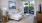 Well-lit living space with balcony access in Pompano Beach