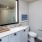 apartment bathroom with glass-enclosed shower at 1333 South Ocean apartments in Pompano Beach